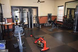 19609 Galway Bay Circle, Unit 303 Germantown, MD 20874 - Photo 21 of 22 a gym area with lots of gym equipment