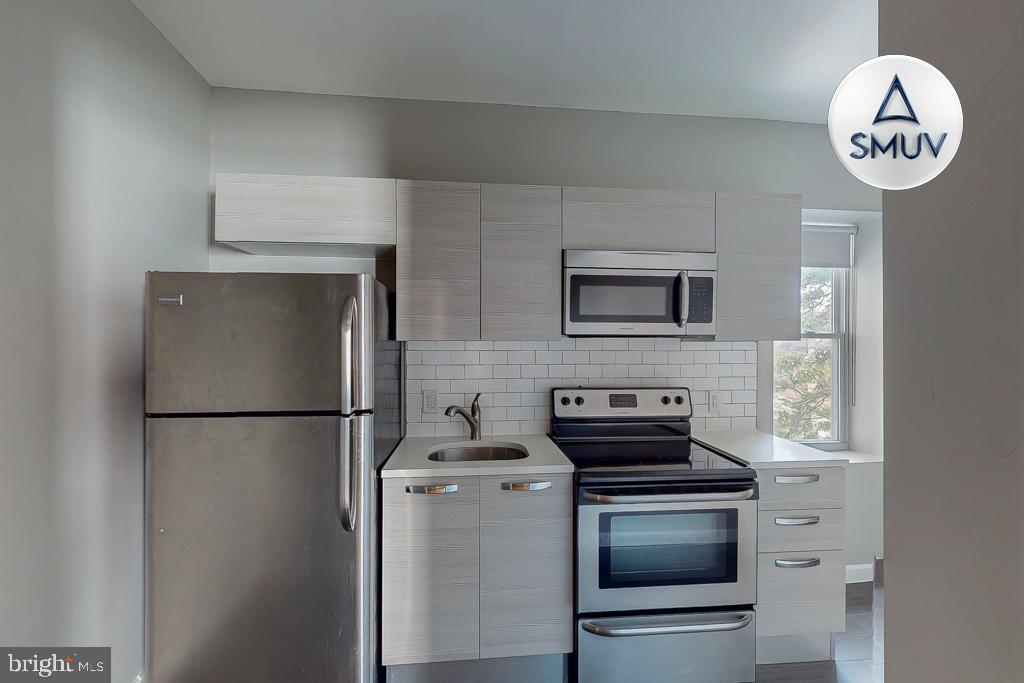 231 East North Avenue, Unit 222 Baltimore, MD 21202 - Photo 12 of 20 Modern kitchen with sleek appliances.