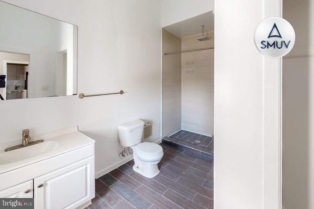 231 East North Avenue, Unit 222 Baltimore, MD 21202 - Photo 14 of 20 Modern bathroom with sleek finishes.