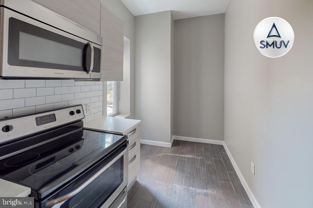 231 East North Avenue, Unit 222 Baltimore, MD 21202 - Photo 16 of 20 Modern kitchen with sleek finishes.