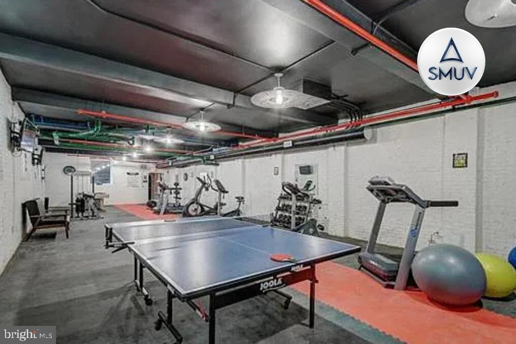 231 East North Avenue, Unit 222 Baltimore, MD 21202 - Photo 6 of 20 Modern fitness space with vibrant accents.