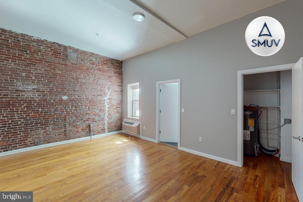 231 East North Avenue, Unit 222 Baltimore, MD 21202 - Photo 10 of 20 Spacious loft with exposed brick charm.