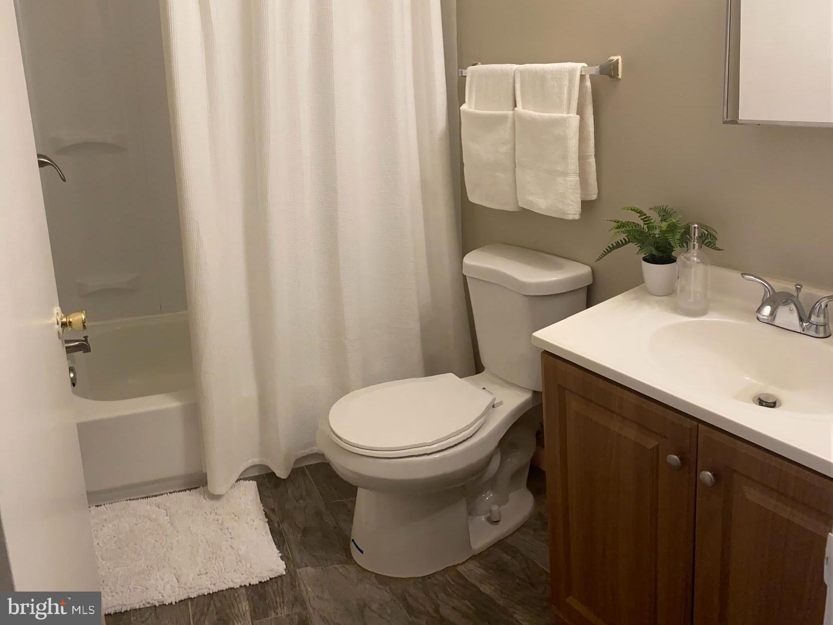 815 Woodchip Road Lumberton, NJ 08048 - Photo 11 of 11 a bathroom with a sink toilet and shower