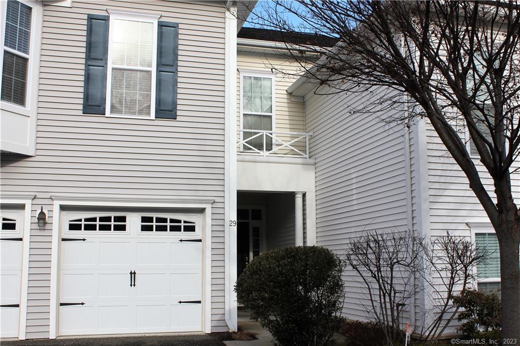 29 Mill Road, Unit 29 Danbury, CT 06810 - Photo 1 of 1 a front view of a house