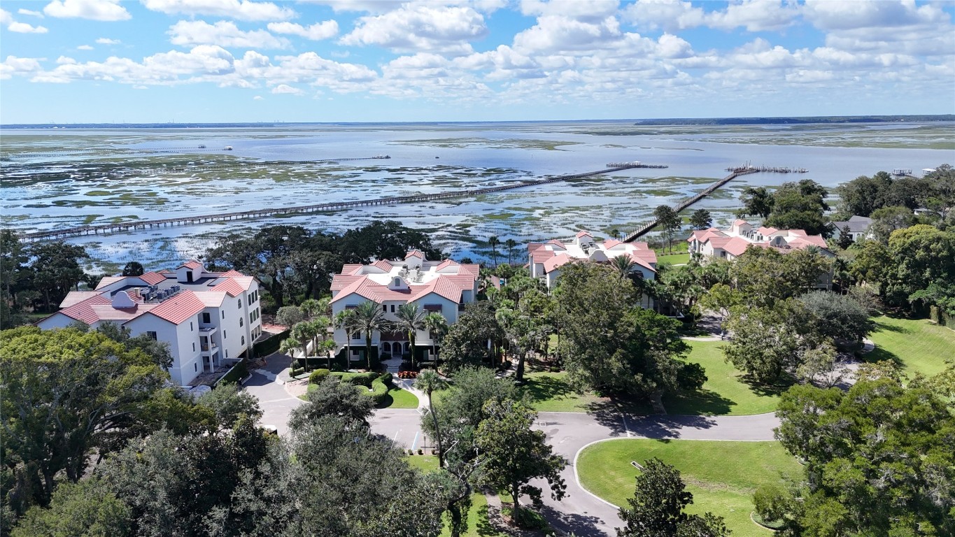5063 1st Coast Highway, Unit 101D Fernandina Beach, FL 32034 - Photo 1 of 58 a view of a lake with a mountain
