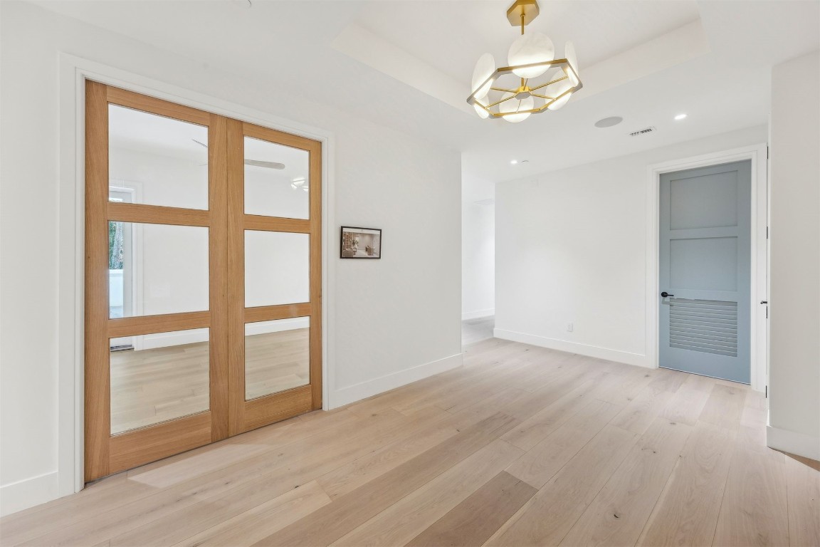 5063 1st Coast Highway, Unit 101D Fernandina Beach, FL 32034 - Photo 13 of 58 Arrival Foyer - Study Doors