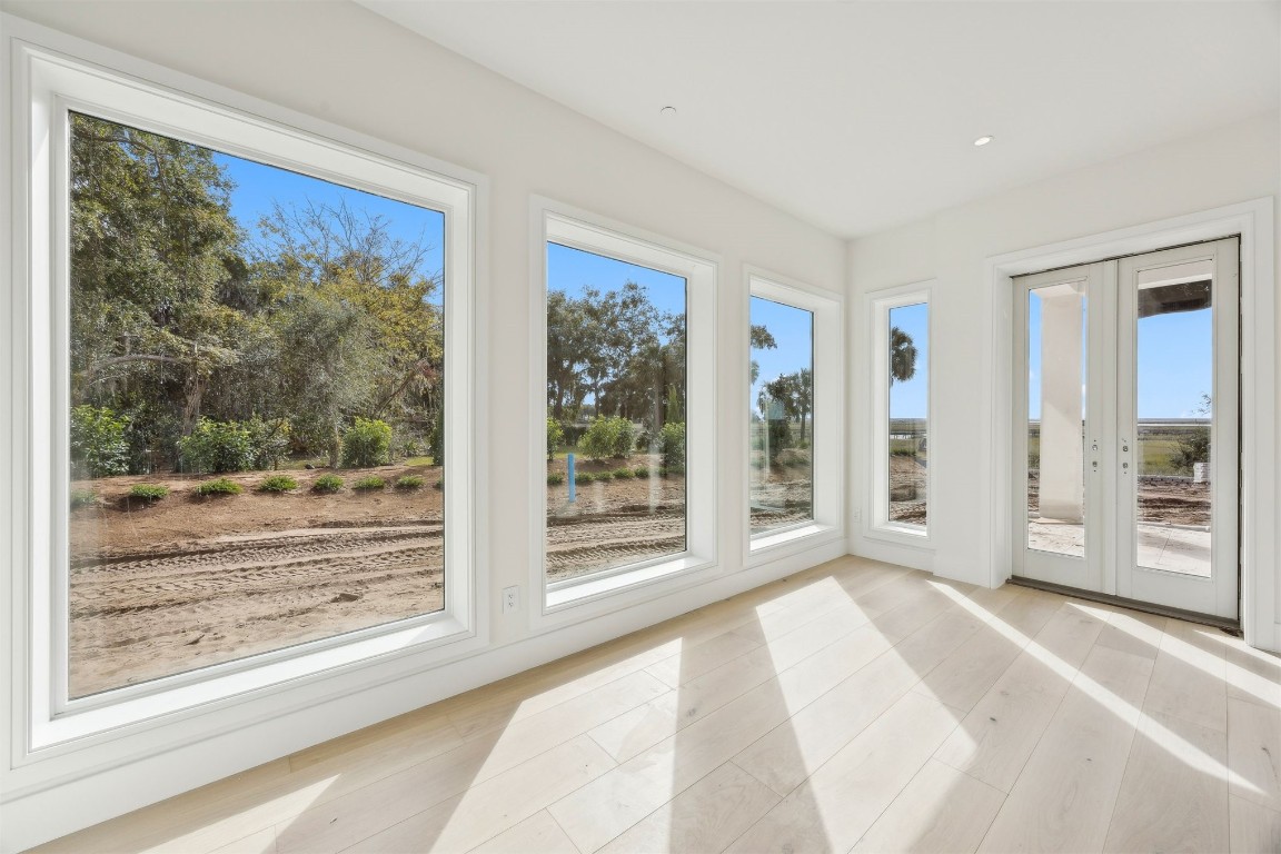 5063 1st Coast Highway, Unit 101D Fernandina Beach, FL 32034 - Photo 20 of 58 a view of a room with a large window and outer view