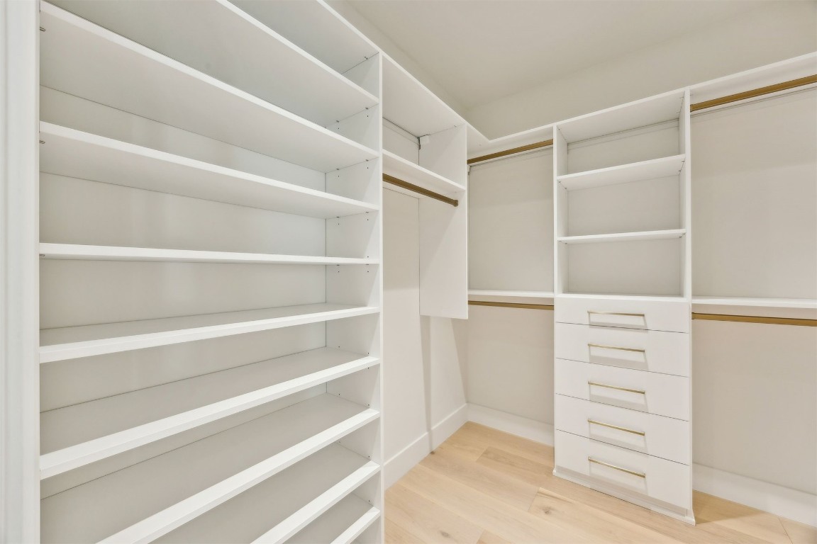 5063 1st Coast Highway, Unit 101D Fernandina Beach, FL 32034 - Photo 24 of 58 a view of walk in closet with empty racks