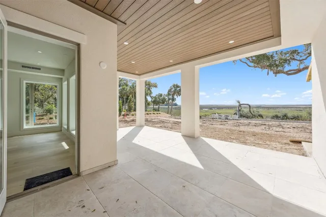 a kitchen with stainless steel appliances granite countertop a stove and a refrigerator