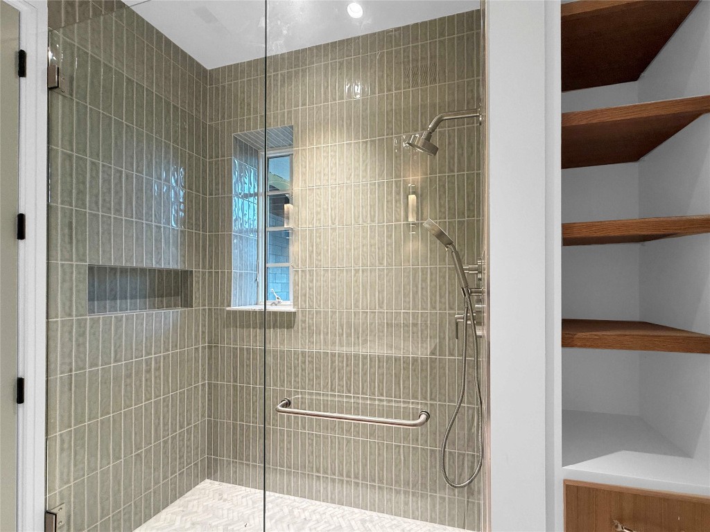 5063 1st Coast Highway, Unit 101D Fernandina Beach, FL 32034 - Photo 36 of 58 a bathroom with a shower