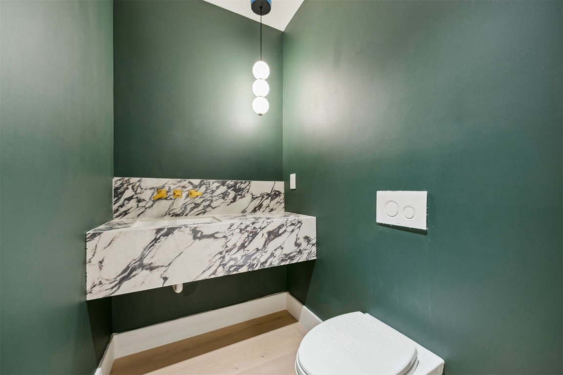 5063 1st Coast Highway, Unit 101D Fernandina Beach, FL 32034 - Photo 38 of 58 a bathroom with a toilet sink and window