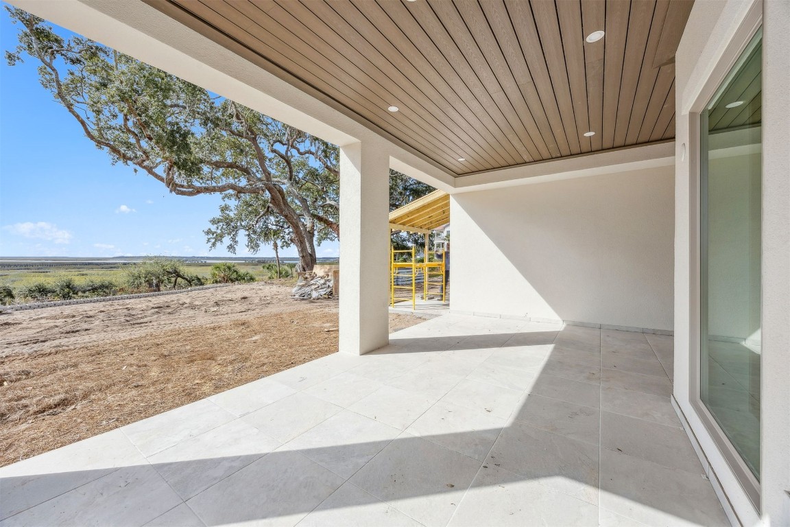 5063 1st Coast Highway, Unit 101D Fernandina Beach, FL 32034 - Photo 40 of 58 a view of an outdoor space and a yard
