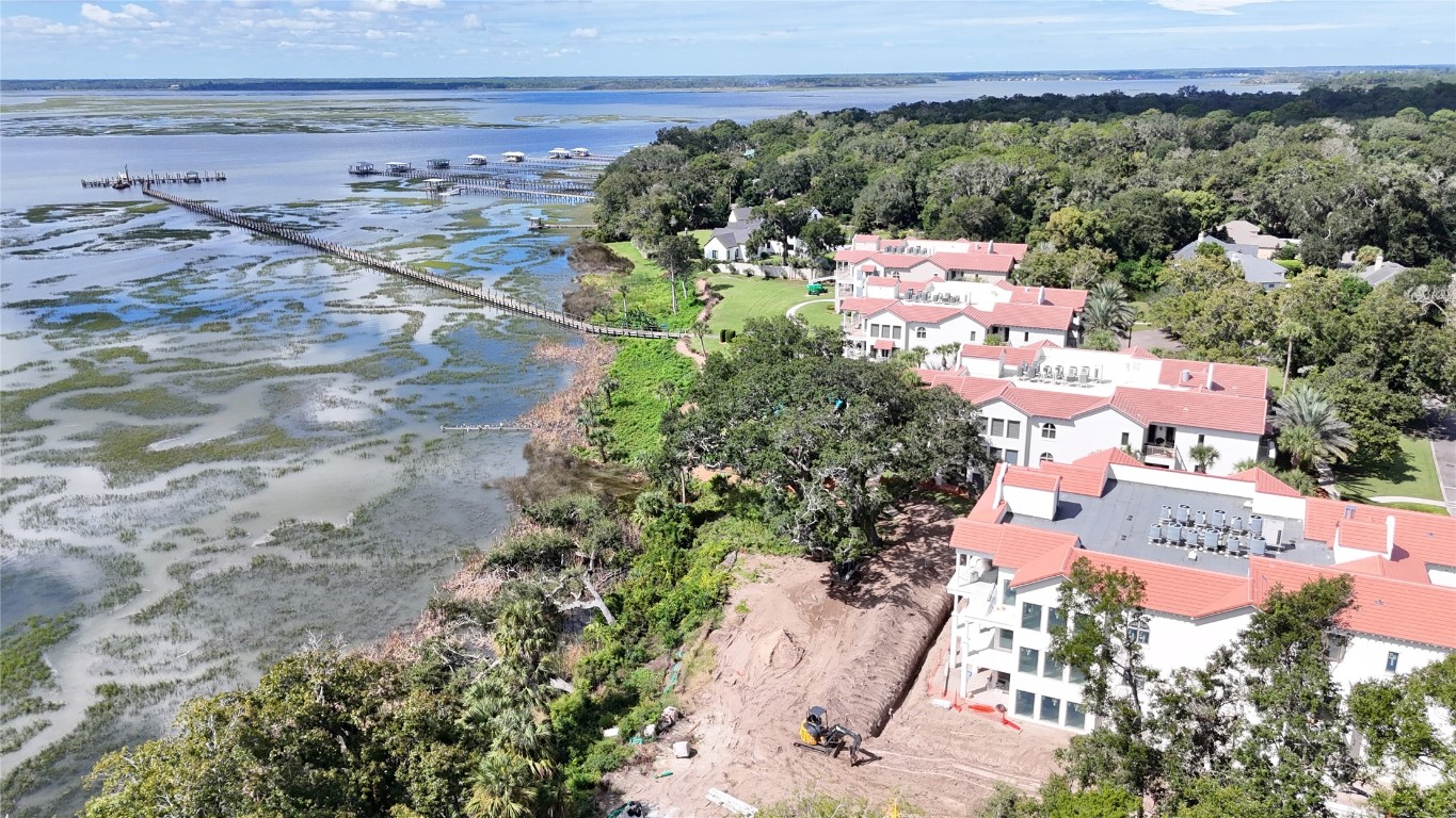 5063 1st Coast Highway, Unit 101D Fernandina Beach, FL 32034 - Photo 46 of 58 an aerial view of a house with a yard