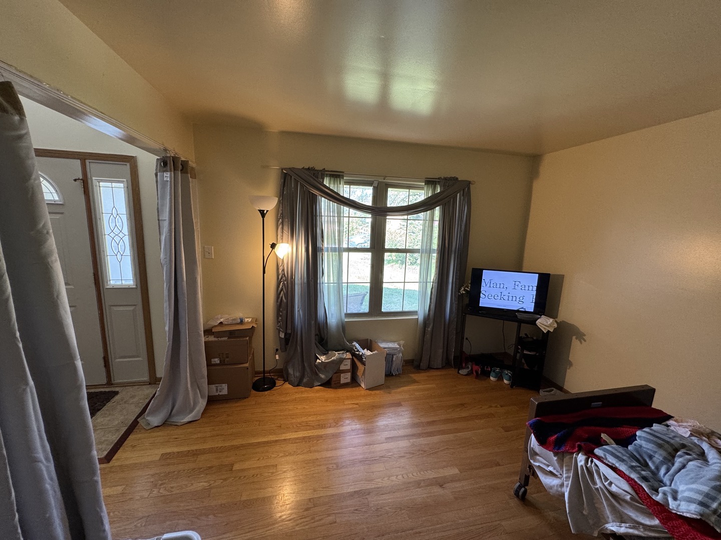 3831 West 154th Street Markham, IL 60428 - Photo 3 of 24 a bedroom with furniture and a window