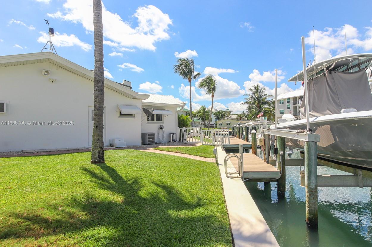 19125 Waterway Road Jupiter, FL 33469 - Photo 27 of 33 a view of a swimming pool