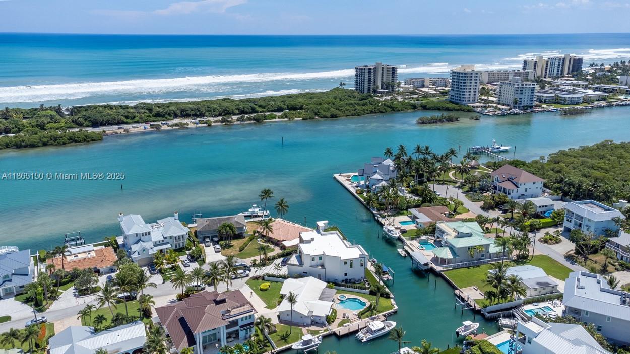 19125 Waterway Road Jupiter, FL 33469 - Photo 28 of 33 a view of a city and ocean view