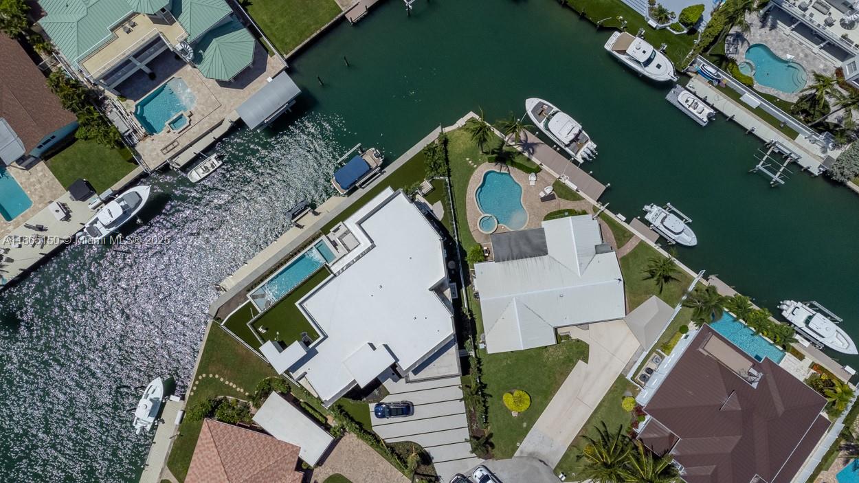 19125 Waterway Road Jupiter, FL 33469 - Photo 30 of 33 an aerial view of a house with a yard
