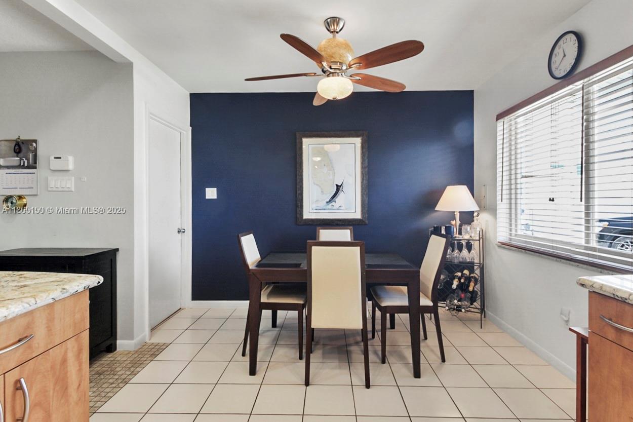 19125 Waterway Road Jupiter, FL 33469 - Photo 10 of 33 a view of a workspace with furniture and a window
