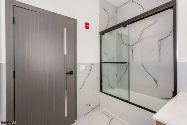 a view of a balcony with wooden floor