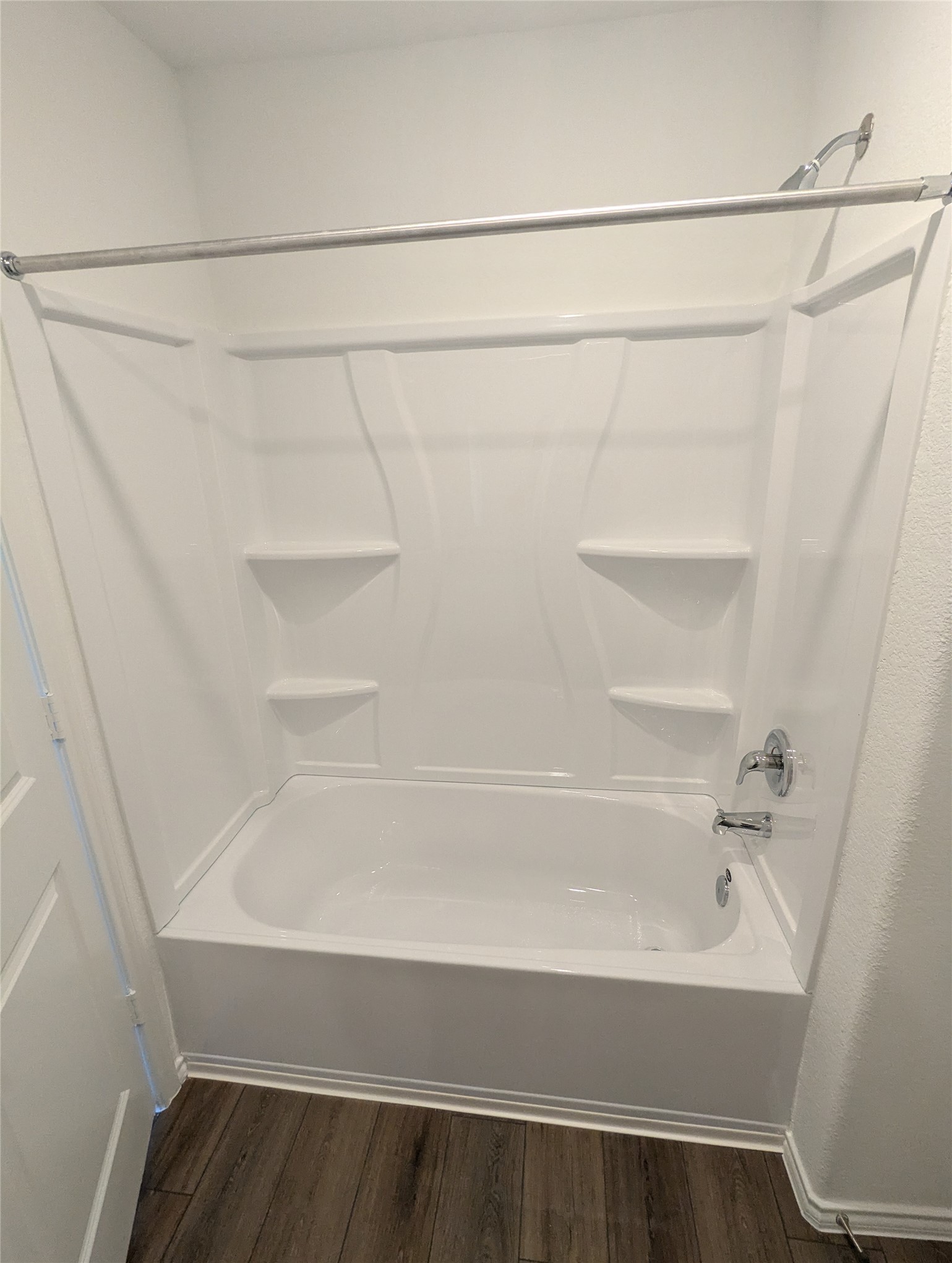 583 Commander Abbott Drive Jarrell, TX 76537 - Photo 14 of 24 a bathroom with a bathtub