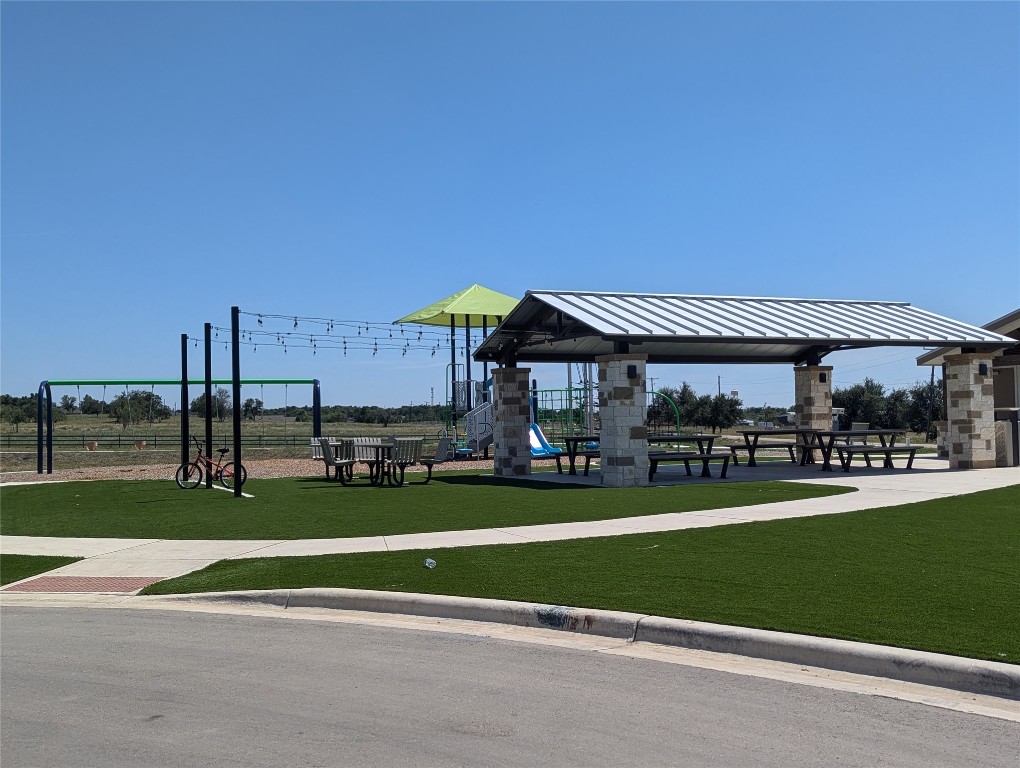 583 Commander Abbott Drive Jarrell, TX 76537 - Photo 22 of 24 a view of a playground