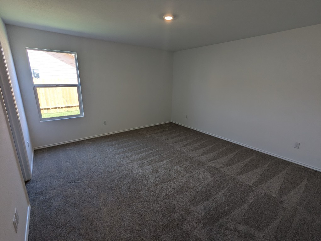 583 Commander Abbott Drive Jarrell, TX 76537 - Photo 8 of 24 an empty room with a window