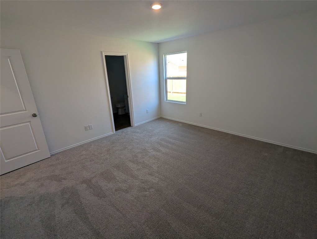 583 Commander Abbott Drive Jarrell, TX 76537 - Photo 9 of 24 an empty room with windows