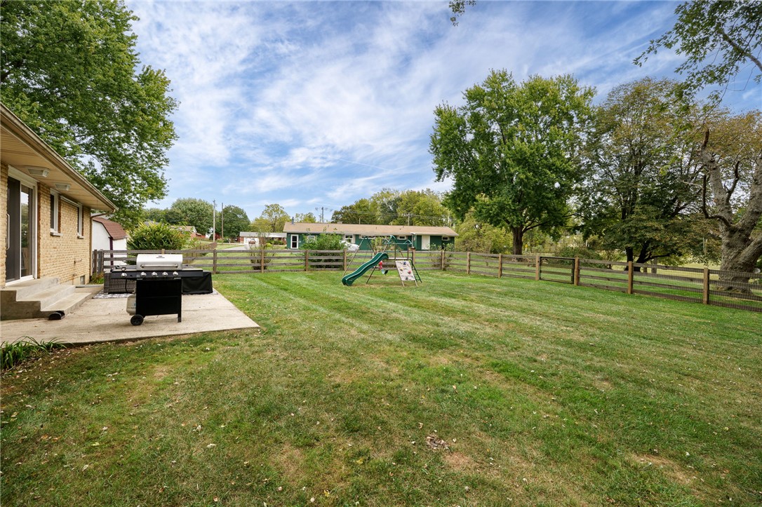 6950 Red Lion 5 Points Road Springboro, OH 45066 - Photo 57 of 78 This verdant outdoor space provides ample room for recreation and relaxation, complete with a private patio.