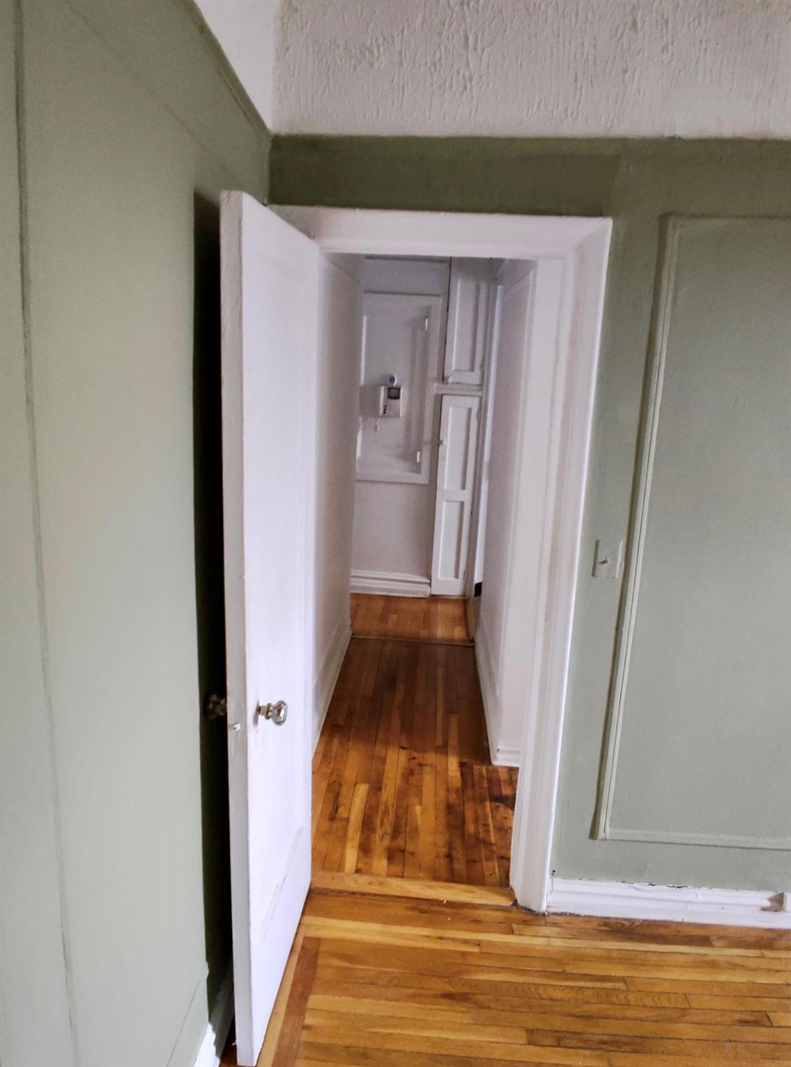 1015 Summit Avenue, Unit 6B Bronx, NY 10452 - Photo 14 of 21 a view of bedroom with wooden floor