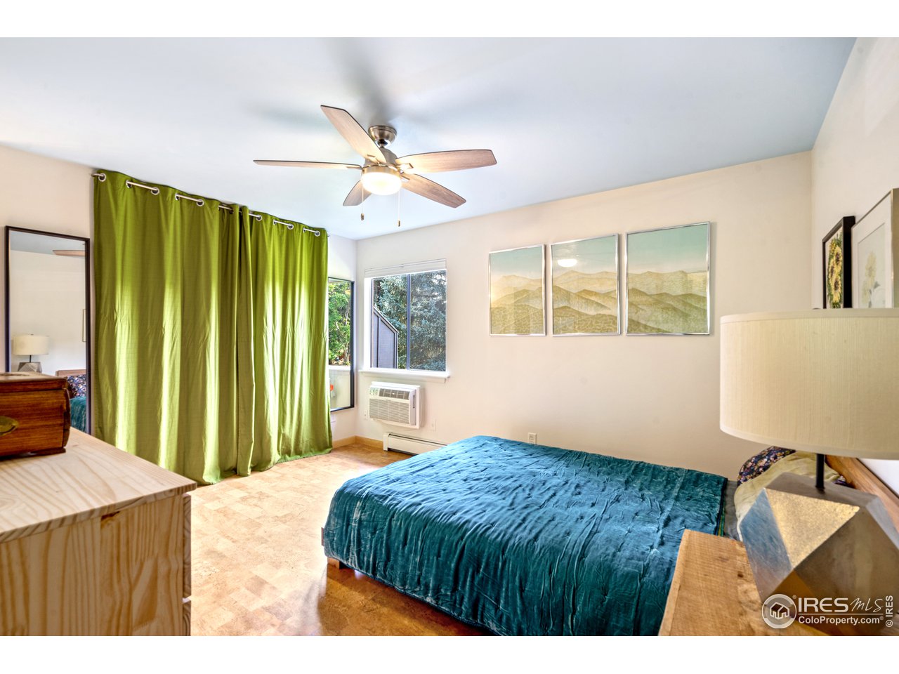 705 East Drake Road, Unit 39 Fort Collins, CO 80525 - Photo 11 of 23 a bedroom with a bed and a window