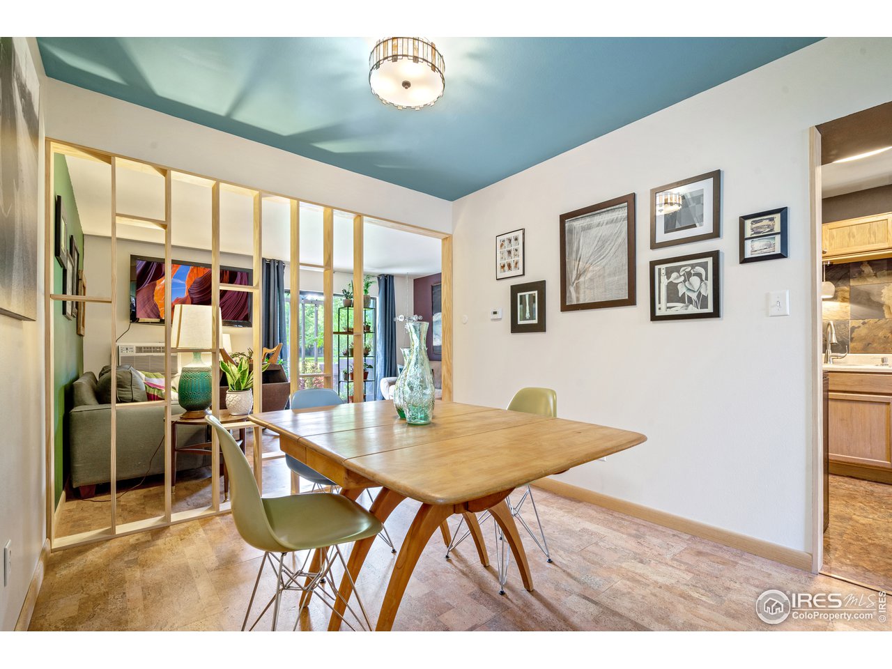 705 East Drake Road, Unit 39 Fort Collins, CO 80525 - Photo 6 of 23 a view of a dining room with furniture window and outside view
