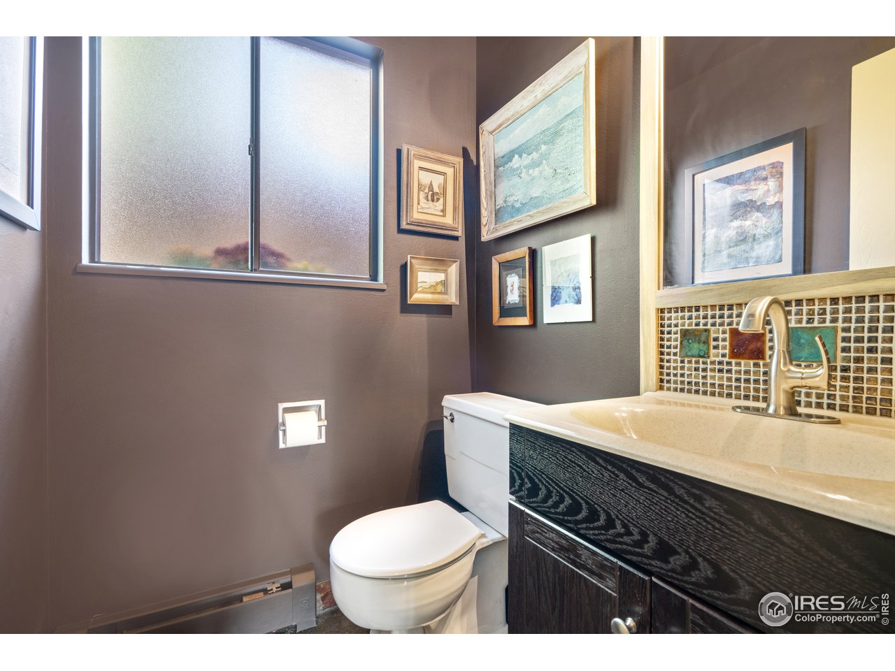 705 East Drake Road, Unit 39 Fort Collins, CO 80525 - Photo 9 of 23 a bathroom with a sink toilet and window