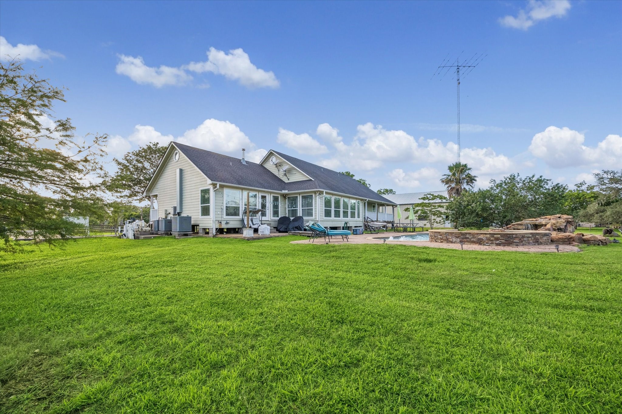 3515 County Road 36 Angleton, TX 77515 - Photo 42 of 50 a view of a house with a big yard
