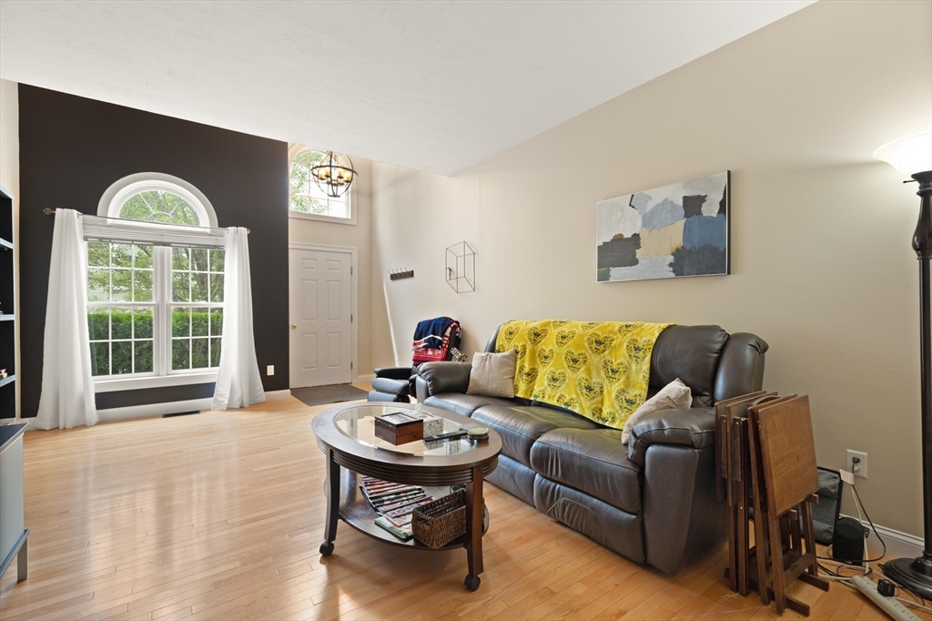 3 Knowlton Circle, Unit 3 Upton, MA 01568 - Photo 11 of 42 a living room with furniture and a large window