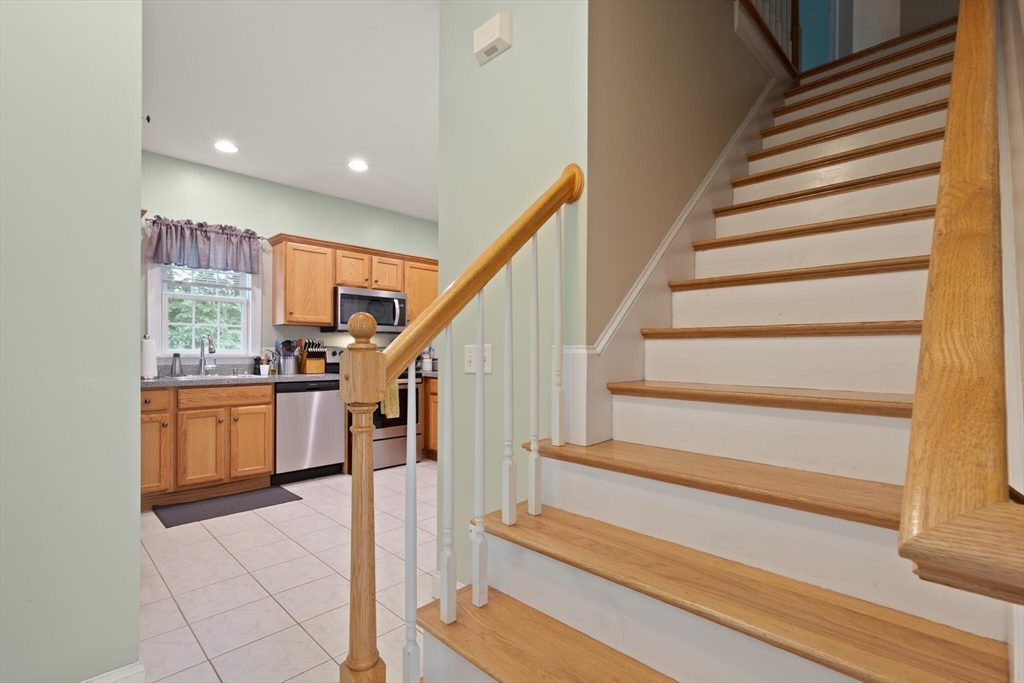 3 Knowlton Circle, Unit 3 Upton, MA 01568 - Photo 20 of 42 a view of entryway and hall with wooden floor