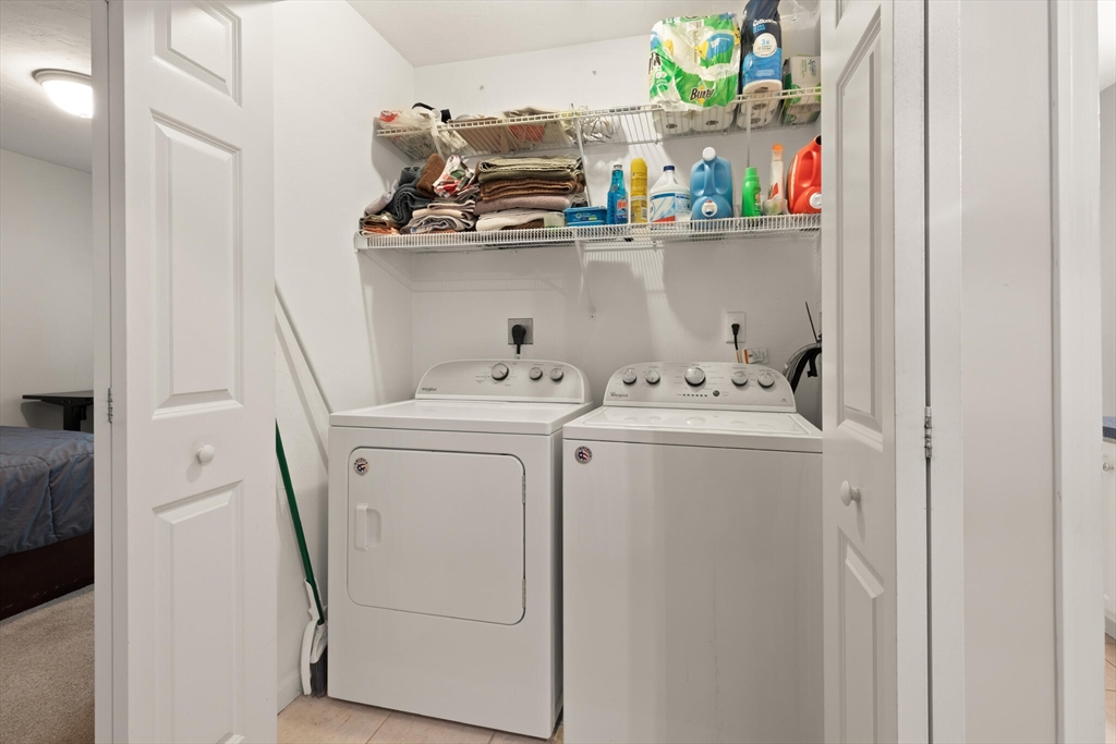 3 Knowlton Circle, Unit 3 Upton, MA 01568 - Photo 32 of 42 a utility room with dryer and washer