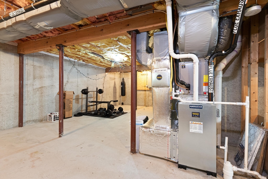 3 Knowlton Circle, Unit 3 Upton, MA 01568 - Photo 33 of 42 a view of a room with gym equipment