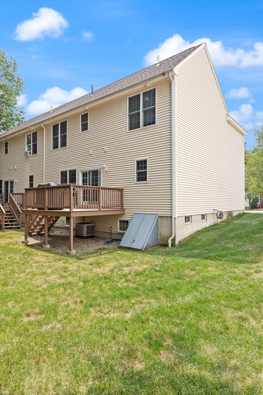 3 Knowlton Circle, Unit 3 Upton, MA 01568 - Photo 39 of 42 a view of a house with yard and sitting area