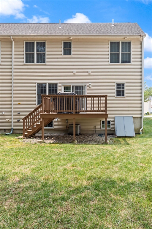 3 Knowlton Circle, Unit 3 Upton, MA 01568 - Photo 40 of 42 a view of a house with backyard and sitting area