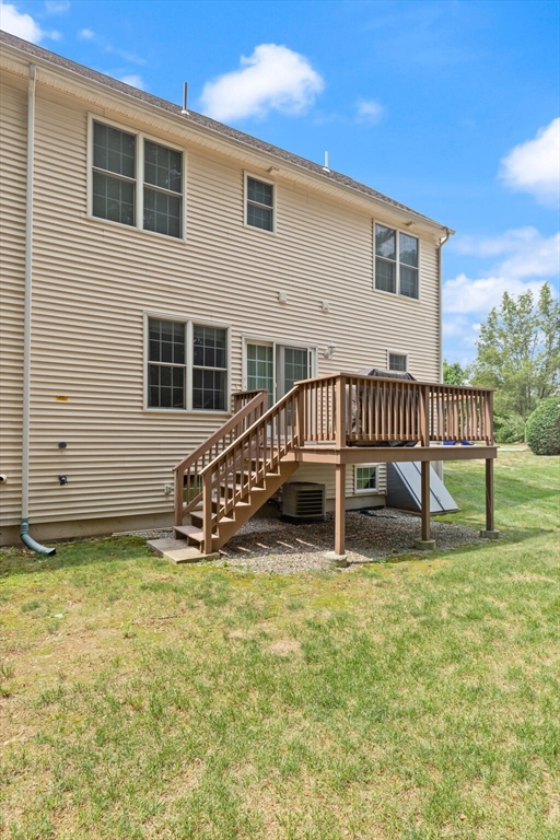 3 Knowlton Circle, Unit 3 Upton, MA 01568 - Photo 41 of 42 a view of a house with backyard and a yard