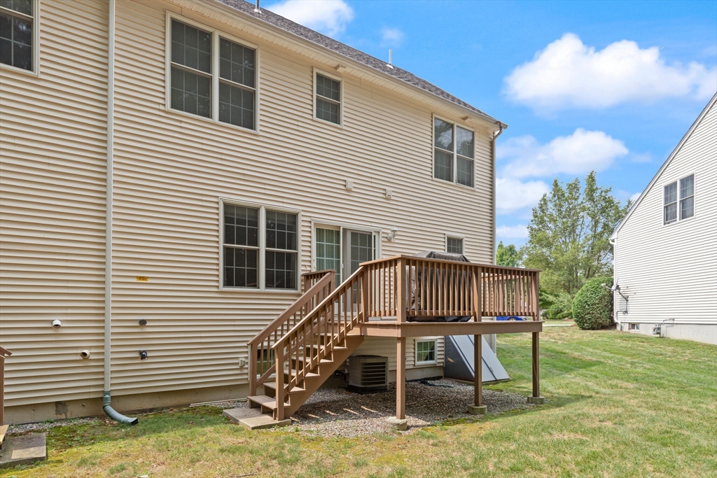 3 Knowlton Circle, Unit 3 Upton, MA 01568 - Photo 42 of 42 a view of a house with a yard