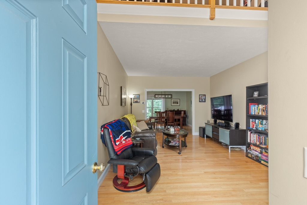 3 Knowlton Circle, Unit 3 Upton, MA 01568 - Photo 6 of 42 a living room with furniture and a wooden floor