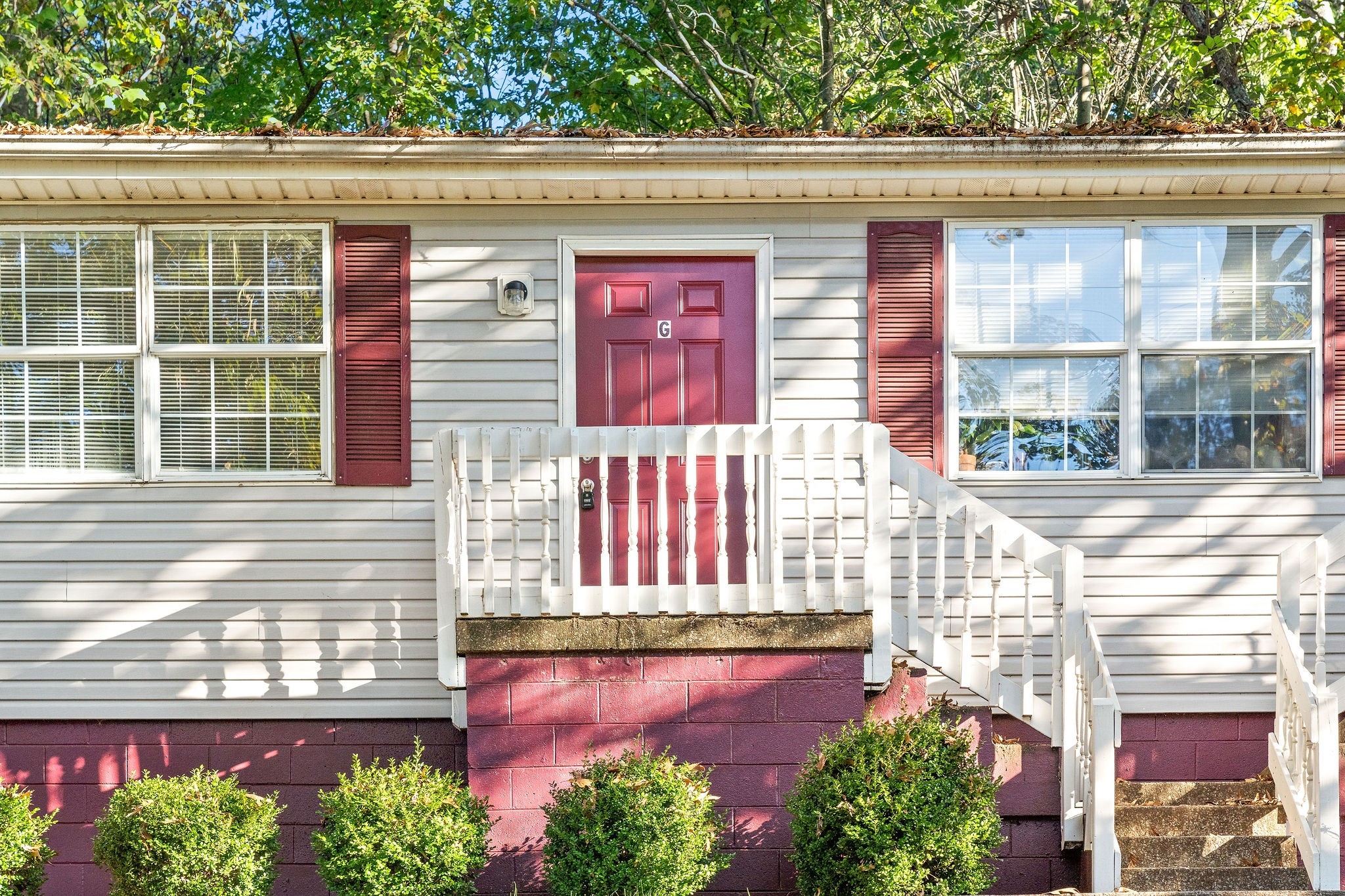 331 Randell Drive, Unit E Clarksville, TN 37042 - Photo 3 of 19 a front view of a house with a yard and outdoor seating