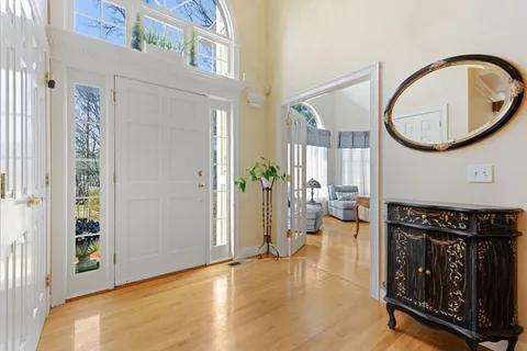a view of a livingroom with furniture and hardwood floor