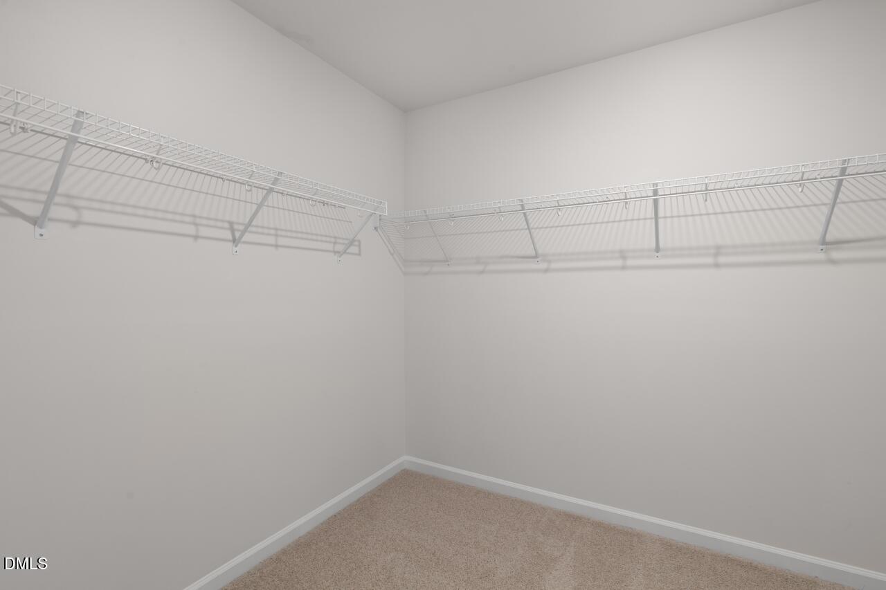 1253 Pavo Path Wendell, NC 27591 - Photo 26 of 41 a view of a room with racks on the wall