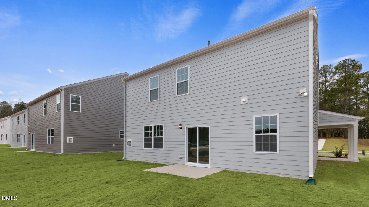 1253 Pavo Path Wendell, NC 27591 - Photo 30 of 41 a backyard of a house with lots of green space