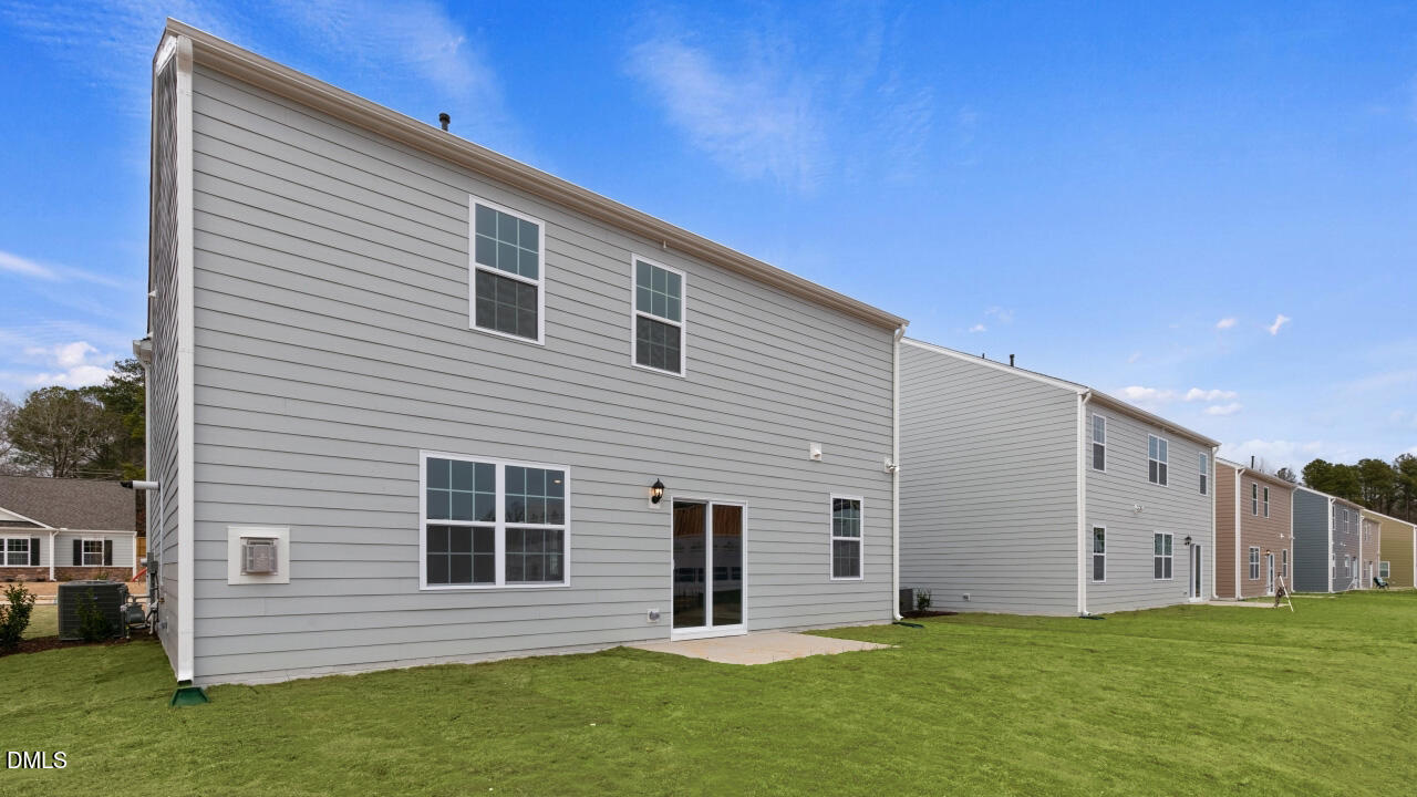 1253 Pavo Path Wendell, NC 27591 - Photo 31 of 41 a house that has a big yard in front of it