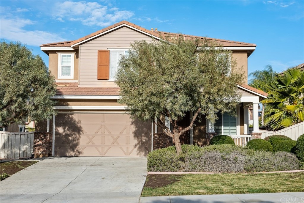 46945 Peach Tree Street Temecula, CA 92592 - Photo 2 of 32 a view of a house with a yard