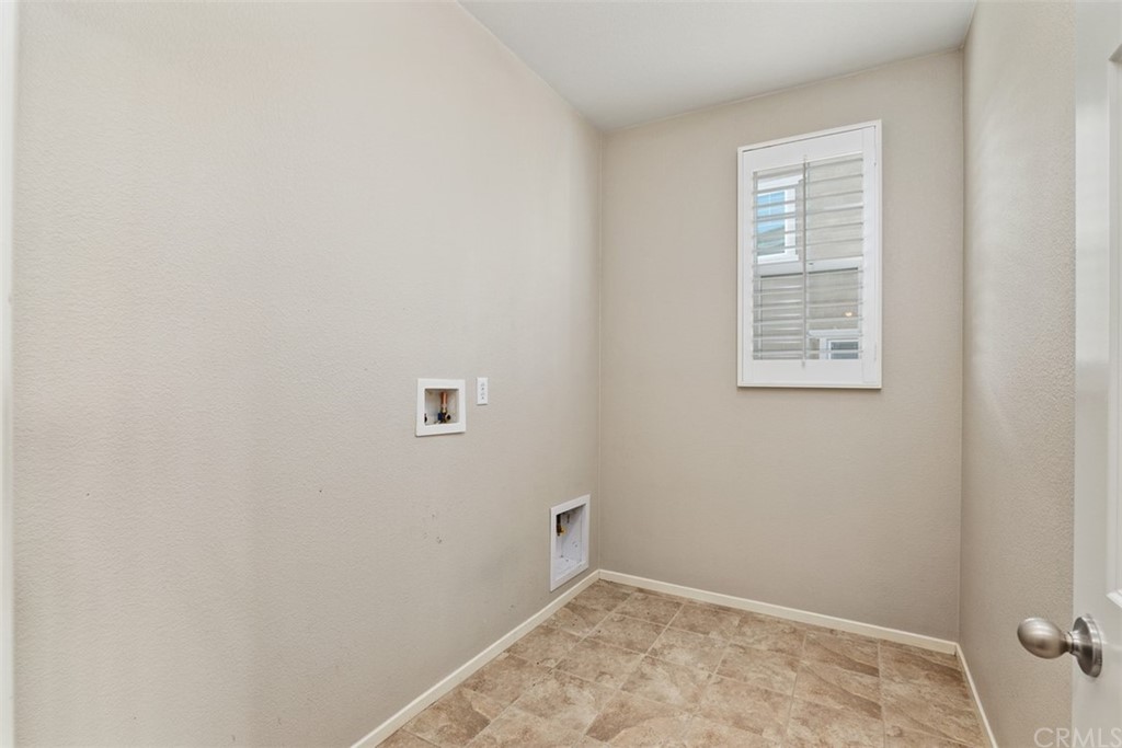 46945 Peach Tree Street Temecula, CA 92592 - Photo 16 of 32 an empty room with a window