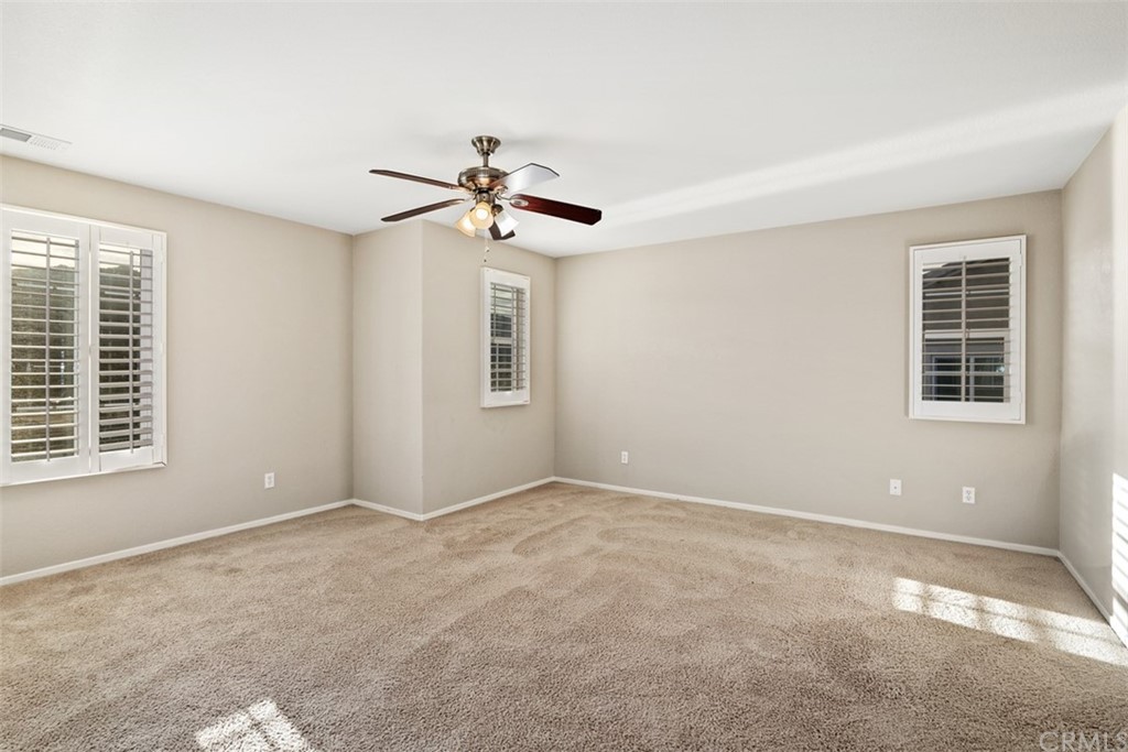 46945 Peach Tree Street Temecula, CA 92592 - Photo 17 of 32 a view of an empty room with a window